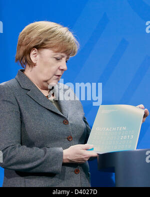Berlin, 27 February 2013, The Independent Expert Commission for Research and Innovation gives his year's report to the German Chancellor Angela Merkel and the German Federal Minister of Education and Research Johanna Wanka. The report illustrates the strengths and weaknesses of the German research and innovation system. On picture: Johanna Wanka (CDU), Federal Minister of Education and Research and ?Angela Merkel, German Chancellor. Stock Photo