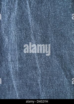 Striped textured used blue jeans denim fabric grunge background Stock Photo