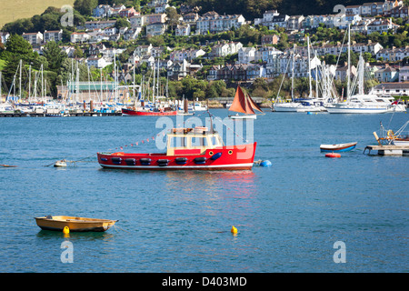 Boats on the river Dart in Dartmouth, South Devon. The town of Kingswear can be seen in the background. Stock Photo