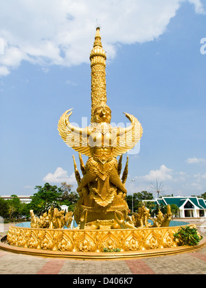 Golden wax sculpture of garuda at Tung Sri Muang park in Ubon Ratchathani province, Thailand Stock Photo