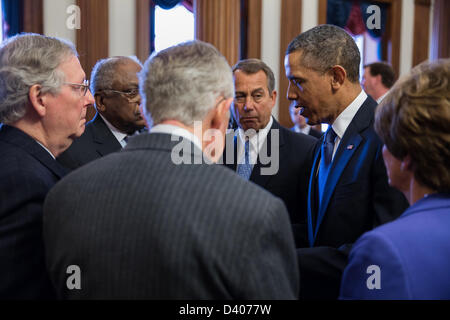 US President Barack Obama talks with Congressional leaders prior to the Rosa Parks statue unveiling ceremony at the US Capitol . Pictured, from left, are: Minority Leader Sen. Mitch McConnell, Rep. James Clyburn, Majority Leader Sen. Harry Reid, House Speaker John Boehner, and House Minority Leader Rep. Nancy Pelosi. Stock Photo
