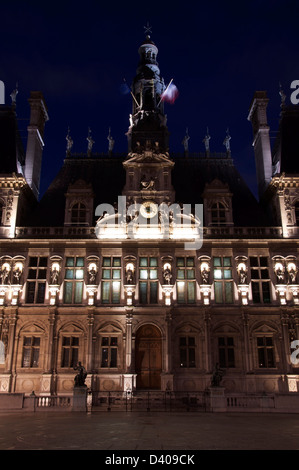 The ornate Hôtel de Ville, historic City Hall of Paris, housing the office of the Mayor and the cities administration. Illuminated by night. France. Stock Photo