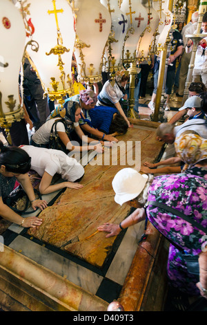 Stone of Anointing in the Church of Holy Sepulchre, Jerusalem Stock Photo