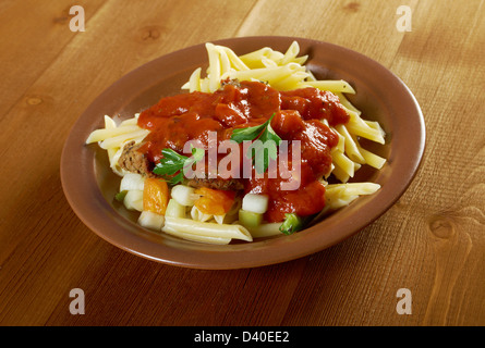 pasta with tomato beef sauce on wooden table Stock Photo