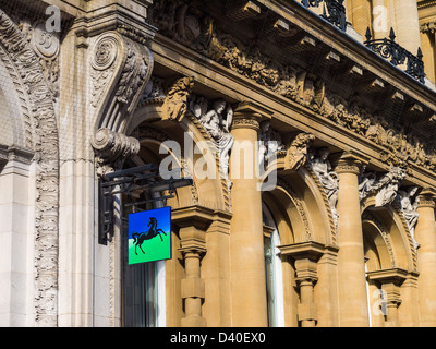 Lloyds TSB Bank sign hanging on the side of a victorian building in Clare Street, Bristol. Stock Photo