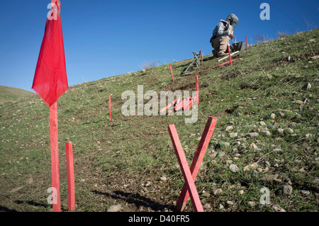 A deminer searches for landmines in northern Iraq. Stock Photo