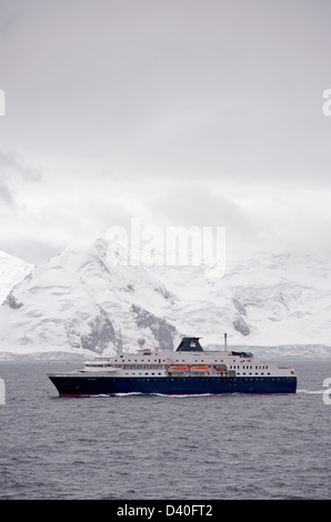 The cruise ship Minerva passing the South Shetland Islands in Antarctica Stock Photo