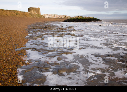 London Clay wave cut platform exposed at low tide on the beach at East Lane, Bawdsey, Suffolk, England Stock Photo