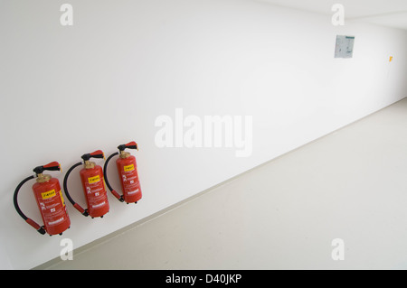 Three extinguishers Stock Photo