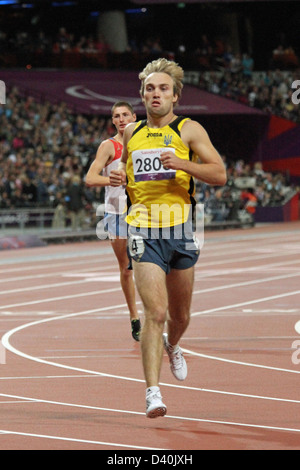 Iurii Tsaruk of Uzbekistan wins the gold medal in the Men's 200m - T35 in Olympic stadium at the London 2012 Paralympic game. Stock Photo