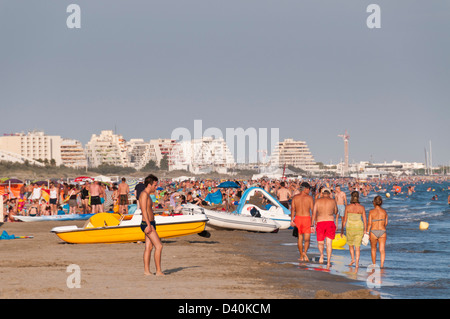 People on the Mediterranean beach, La Grande Motte, Hérault, Languedoc Roussillon, France Stock Photo