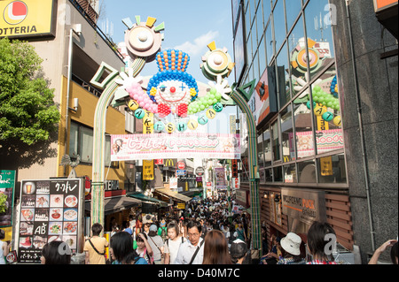 Takeshita Dori is a busy shopping street especially for young people in Harajuku, Tokyo - Japan. Stock Photo