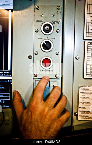 Hand and control buttons on Nuclear Submarine HMS Talent Stock Photo