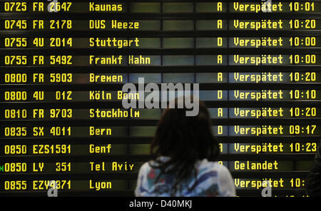 (dpa FILE) - An archive picture, dated 10 December 20120, shows an information panel displaying delayed flights at the Schoenfeld airport in Berlin, Germany. The European Court of Justice has ruled on passenger rights concerning delayed flights in favour of passengers on Tuesday 26 February 2013. Photo: Hannibal Hannibal Hanschke Stock Photo