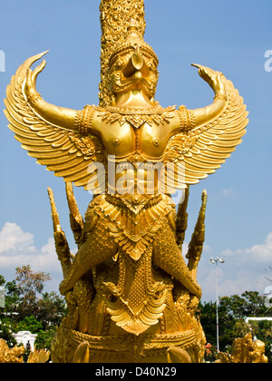 Golden wax sculpture at Tung Sri Muang park in Ubon Ratchathani province, Thailand Stock Photo