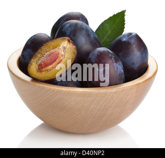 fresh plums in bowl isolated Stock Photo