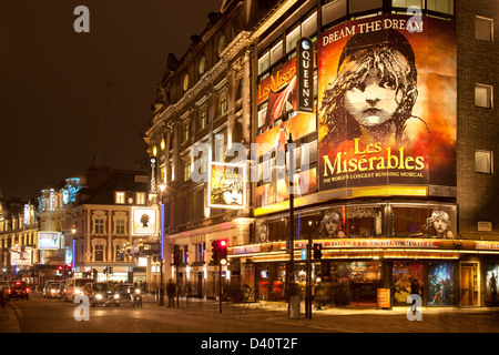 Heart of London theatreland, Shaftesbury Avenue: Queens Theatre with Les Miserables, Gielgud, Apollo and Lyric theatres at night Stock Photo