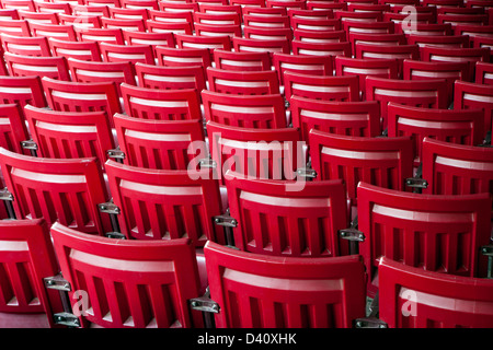 Repetition of Red Chair Patterns Stock Photo