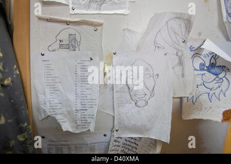 Nairobi, Kenya. 26th Feb 2013. Behind the scenes of Kenya's political satire 'The XYZ Show'. Caricature sketches on a pin board. Stock Photo