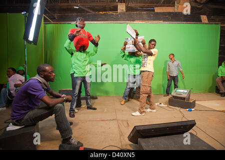 Nairobi, Kenya. 26th Feb 2013. Behind the scenes of Kenya's political satire 'The XYZ Show' puppeteers film the 2013 election special against a green screen. Stock Photo
