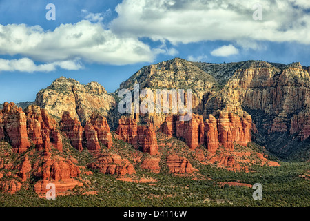 Afternoon clouds pass over the spectacular Red Rock Country of Sedona, Arizona. Stock Photo