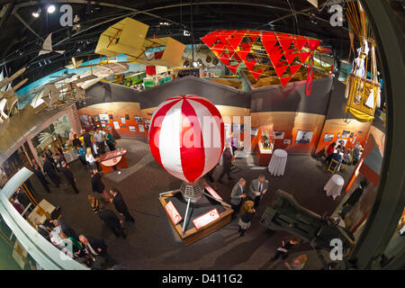 Feb. 27, 2013 - Garden City, New York, U.S. - At the 10th Annual Cradle of Aviation Museum Air & Space Gala, celebrating the 40th Anniversary of Apollo 17, the Cocktail Hour is held in the museum's main Exhibition Hall. 180 degree fish eye lens view from above. Stock Photo