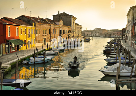 Evening canal in Murano with boats, island near Venice, Italy Stock Photo