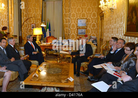 US Secretary of State John Kerry meets with Italian Prime Minister Mario Monti February 28, 2013 in Rome, Italy. Kerry is on an 11-day trip, his first as secretary of state stopping in London, Berlin, Paris, Rome, Ankara, Cairo, Riyadh, Abu Dhabi and Doha. Stock Photo