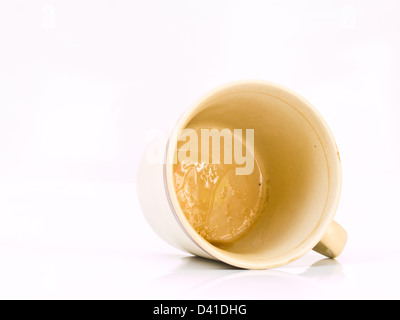 A brown ceramic cup isolated on white background Stock Photo