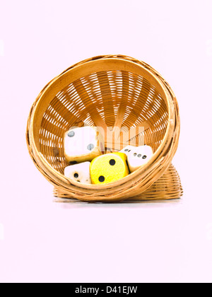 A traditional handmade wicker and dices from Thailand Stock Photo