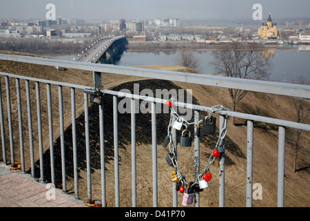 Russia. Spring. Nizhny Novgorod: locks on the bridge lovers. Embankment Fedorovsky. Stock Photo