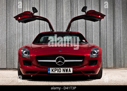 Red Mercedes Benz SLS AMG luxury car with wing doors, Winchester, UK, 03 09 2010 Stock Photo