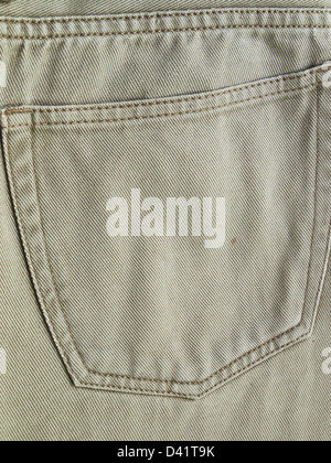 Close up back pocket on khaki jean pants Stock Photo