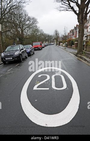 20 mph speed limit road marking signs on the streets of Brighton UK Stock Photo