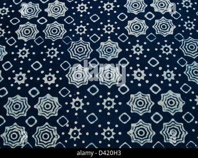 Blue batik fabric with repetition pattern as background from Yogyakarta, Indonesia Stock Photo