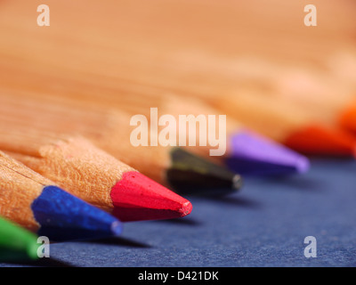 Selective closeup shot of colorful wooden crayons Stock Photo