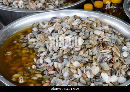 pickled banded wedge shell in market Stock Photo