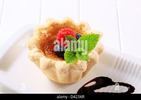 Mini tartlet shell filled with Creme brulee Stock Photo