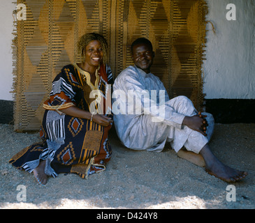 Adamaoua North Cameroon Adamaoua Mosque Man And Woman Sitting On The Floor Stock Photo
