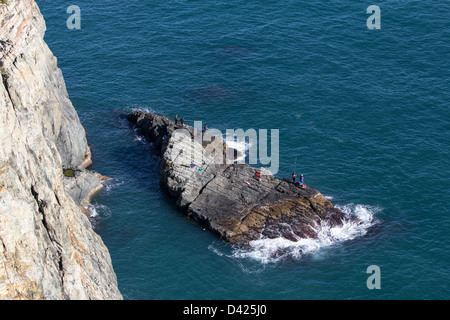 Taejongdae Cliffs and fishermen Stock Photo