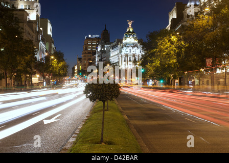 Madrid, Spain, in the evening on the Gran Via, center in the background, the Edificio Metropolis Stock Photo
