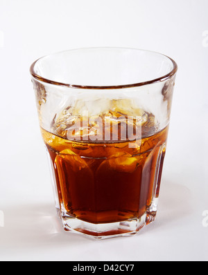 Glass with cola and ice Stock Photo