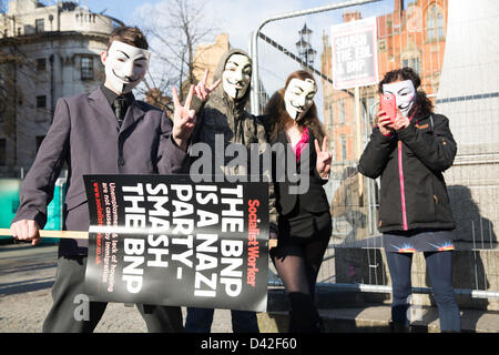 Manchester, UK. 2nd March 2013. Members of the far-right English Defence League (EDL) clash with police during a protest in Manchester. Approximately 300 members of the 'Islamophobic' group attended. protesters against the EDL holding banners at Albert Square. Credit: Lydia Pagoni/Alamy Live News Stock Photo