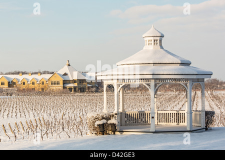 Canada,Ontario,Niagara-on-the-Lake Ontario, Peller Estate Winery in winter with a gazebo in the foreground Stock Photo