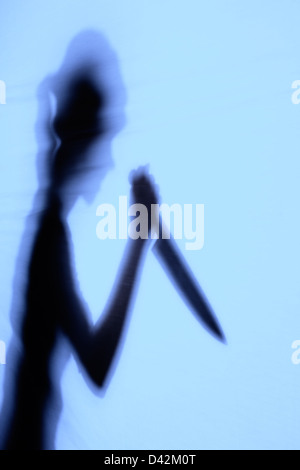 Freiburg, Germany, the silhouette of a woman with a knife in his hand Stock Photo