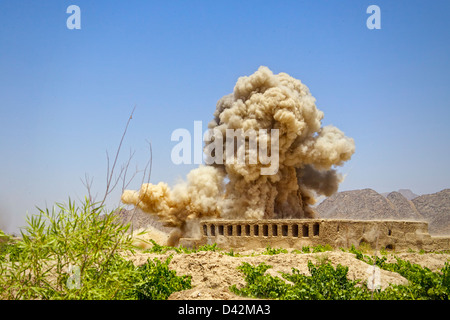 International Security Assistance Force soldiers detonate a set of Improvised Explosive Devices found along a path. Stock Photo