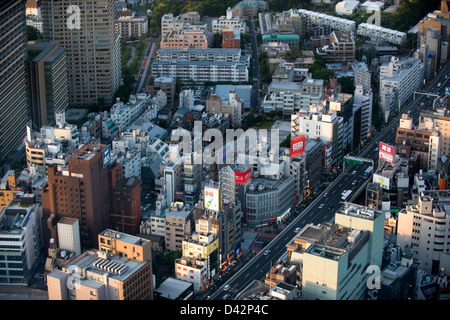 Daytime aerial view of metropolitan downtown Tokyo city skyline with high-rise buildings and neighborhoods Stock Photo