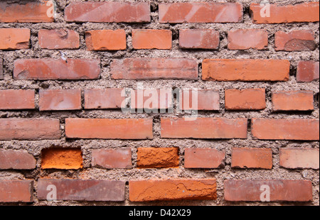 Red brick wall in old town in Alsace, France Stock Photo