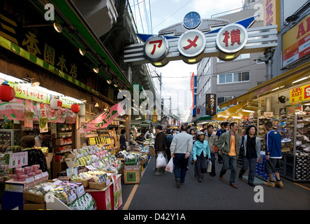 Ameyoko-cho, former black market under railway in Okachimachi Tokyo, is a thriving food and merchandise marketplace for bargains Stock Photo