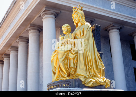 Golden Blessed Virgin Mary with baby Jesus. Stock Photo